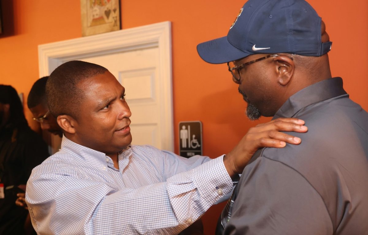 Don talking with voters
